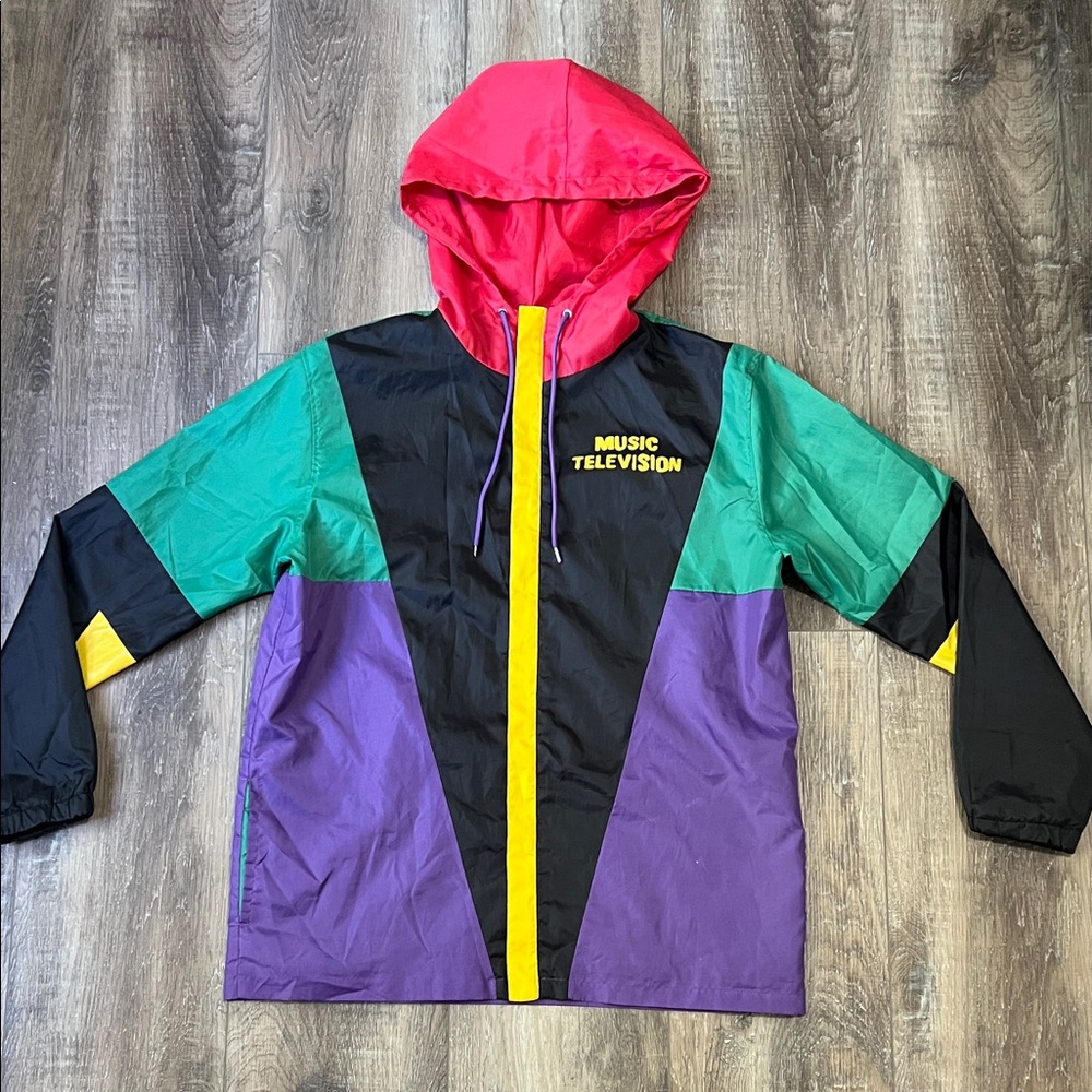 MTV light rain jacket circa 2020. Size L. In great condition. Zipper works great